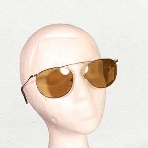 Calvin Klein Marchon CK26106ST Sunglasses in Light Gold | Unisex